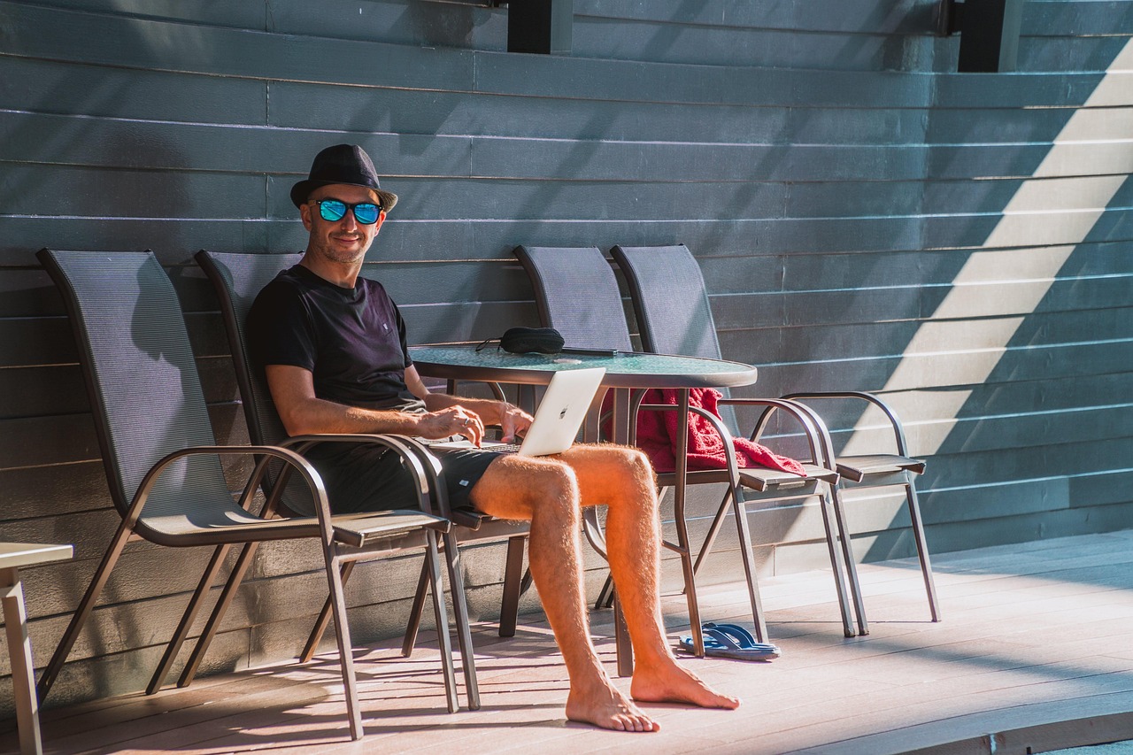 Man, laptop, work — Fantasy vs. Reality: The Psychological Effects of Adult Content on Identity