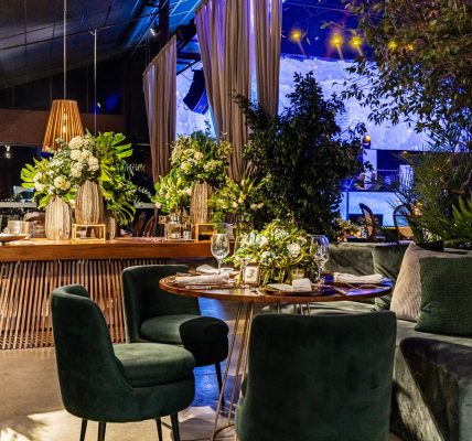 Luxurious indoor setting featuring ornate floral arrangements and elegant seating, perfect for special occasions. — Skirting