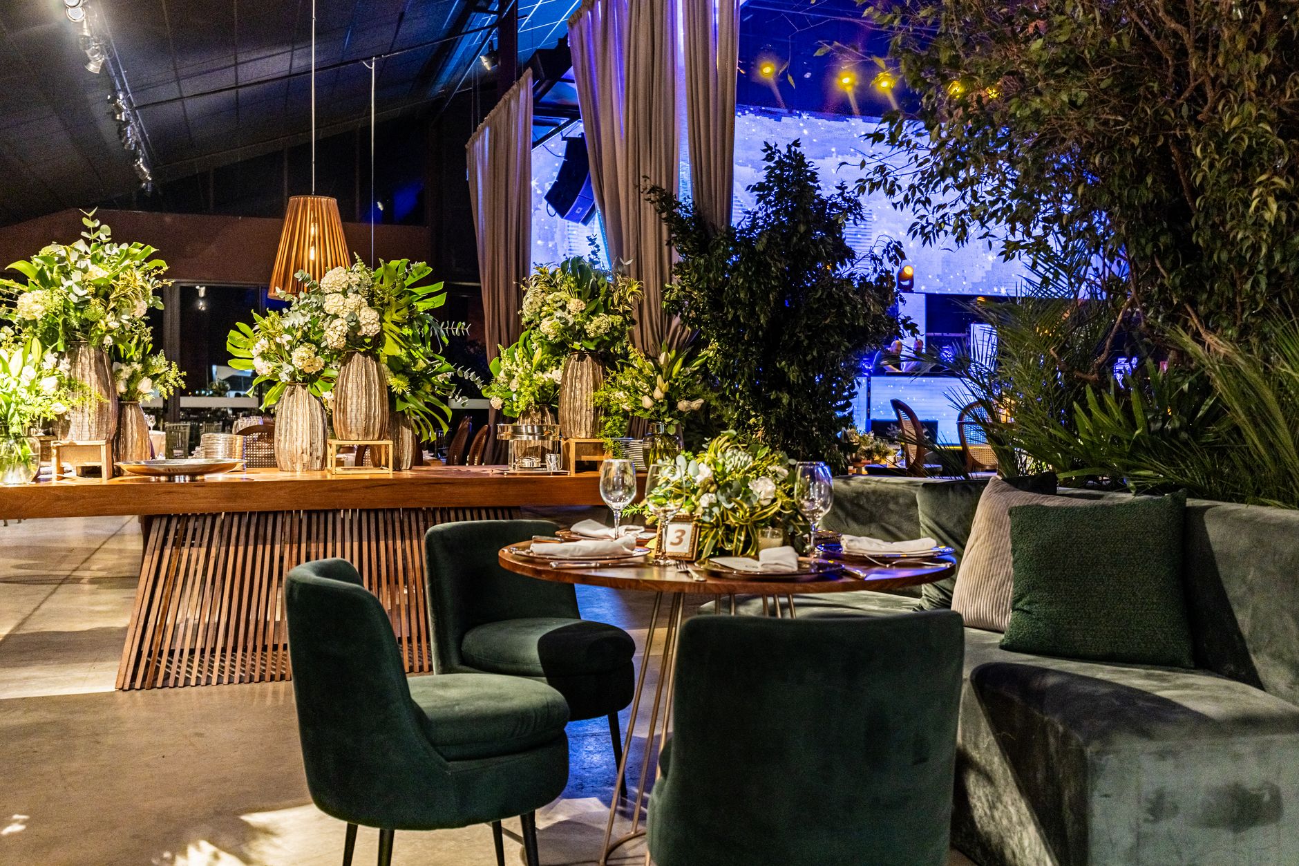 Luxurious indoor setting featuring ornate floral arrangements and elegant seating, perfect for special occasions. — Skirting